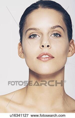Close up of womans serious face View Large Photo Image Stock Photo - Close up of womans serious face. Fotosearch