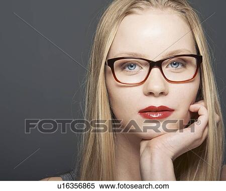 Close up of womans serious face View Large Photo Image Stock Photography - Close up of womans serious face. Fotosearch