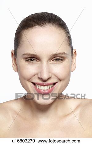 Stock Photo - Close up of womans smiling face. Fotosearch
