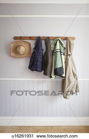 Coats and hat on coat rack View Large Photo Image Stock Image - Coats and hat on coat rack. Fotosearch