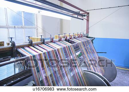 Colorful yarn on loom in textile mill View Large Photo Image Stock Image - Colorful yarn on loom in textile mill. Fotosearch