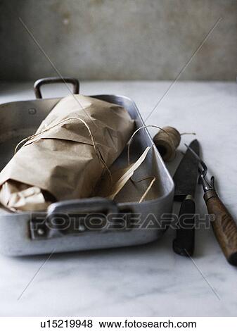 Dish of meat in butchers paper View Large Photo Image Stock Photo - Dish of meat in butchers paper. Fotosearch