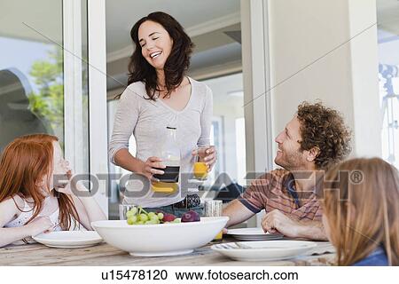 Family having breakfast together View Large Photo Image Stock Image - Family having breakfast together. Fotosearch