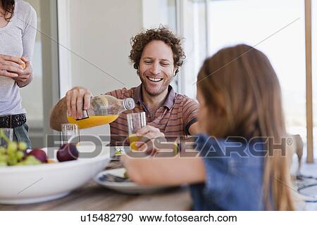 Family having breakfast together View Large Photo Image Stock Image - Family having breakfast together. Fotosearch