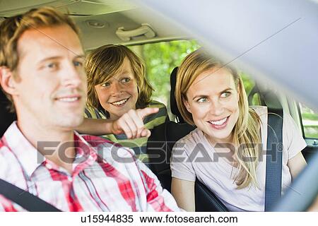 Family riding in car together View Large Photo Image Stock Photography - Family riding in car together. Fotosearch