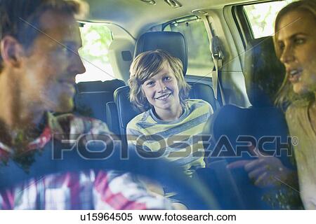 Family riding in car together View Large Photo Image Stock Photography - Family riding in car together. Fotosearch