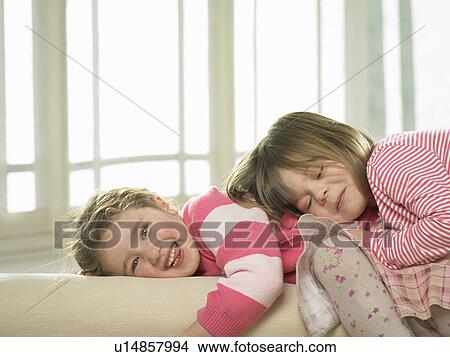 Girls playing together indoors View Large Photo Image Picture - Girls playing together indoors. Fotosearch