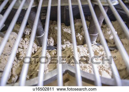 Machinery working in biscuit factory View Large Photo Image Stock Image - Machinery working in biscuit factory. Fotosearch