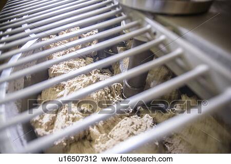 Machinery working in biscuit factory View Large Photo Image Stock Image - Machinery working in biscuit factory. Fotosearch