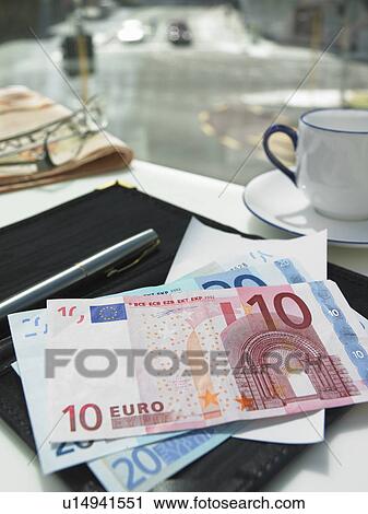 Money in check on restaurant table View Large Photo Image Stock Image - Money in check on restaurant table. Fotosearch