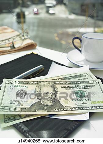 Money in check on restaurant table View Large Photo Image Stock Photography - Money in check on restaurant table. Fotosearch