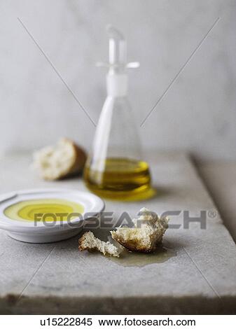 Plate of olive oil with crusty bread View Large Photo Image Stock Photography - Plate of olive oil with crusty bread. Fotosearch