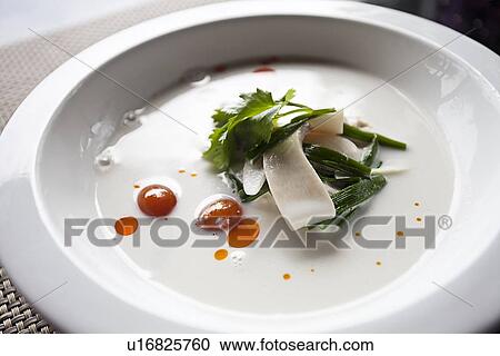 Stock Image - Plate of salad with cheese. Fotosearch