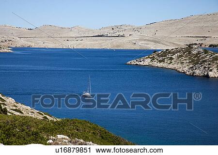 Sailboat on still lake View Large Photo Image Stock Image - Sailboat on still lake. Fotosearch