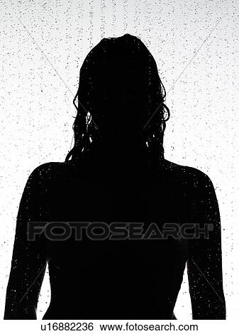 Stock Photograph - Silhouette of woman in shower. Fotosearch