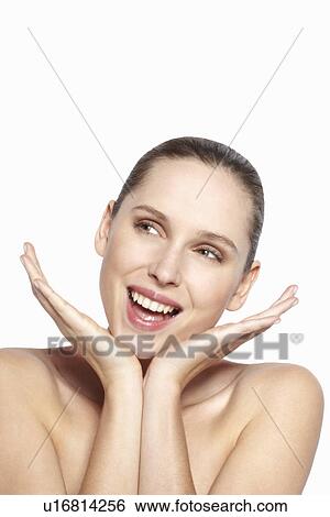 Smiling woman resting chin in hands View Large Photo Image Stock Photograph - Smiling woman resting chin in hands. Fotosearch