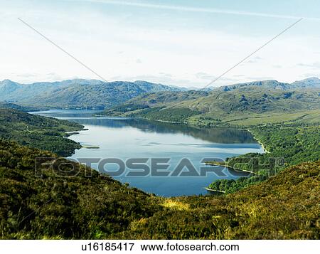 Still lake in rural landscape View Large Photo Image Stock Photo - Still lake in rural landscape. Fotosearch