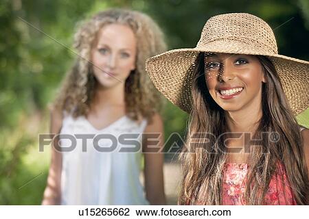 Teenage girl smiling on rural road View Large Photo Image Stock Image - Teenage girl smiling on rural road. Fotosearch