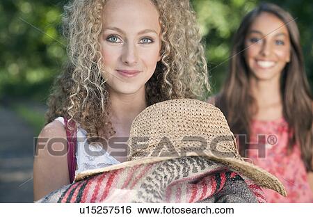 Teenage girl with blanket and hat View Large Photo Image Stock Photograph - Teenage girl with blanket and hat. Fotosearch