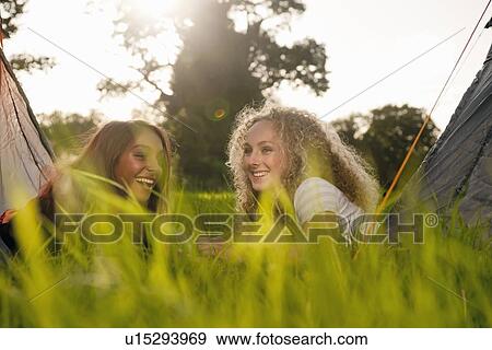 Teenage girls laying in tents View Large Photo Image Stock Photo - Teenage girls laying in tents. Fotosearch
