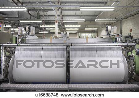 Thread on loom in textile mill View Large Photo Image Stock Photo - Thread on loom in textile mill. Fotosearch
