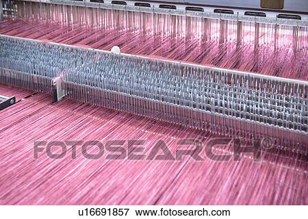 Thread on loom in textile mill View Large Photo Image Stock Photo - Thread on loom in textile mill. Fotosearch