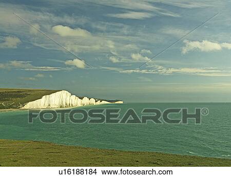 Picture - White cliffs over ocean on beach. Fotosearch