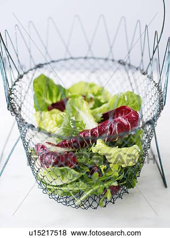 Wire bowl of mixed salad View Large Photo Image Stock Photo - Wire bowl of mixed salad. Fotosearch