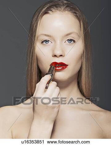 Woman having makeup applied View Large Photo Image Stock Image - Woman having makeup applied. Fotosearch