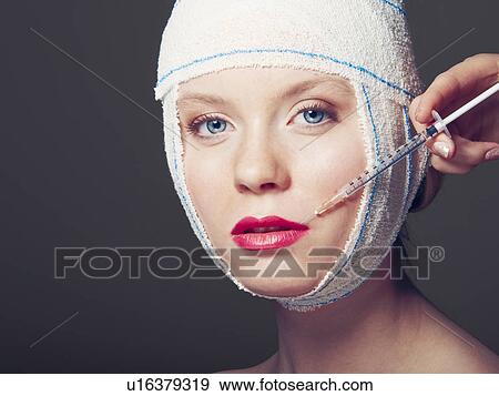 Woman in bandages having injection View Large Photo Image Stock Photo - Woman in bandages having injection. Fotosearch