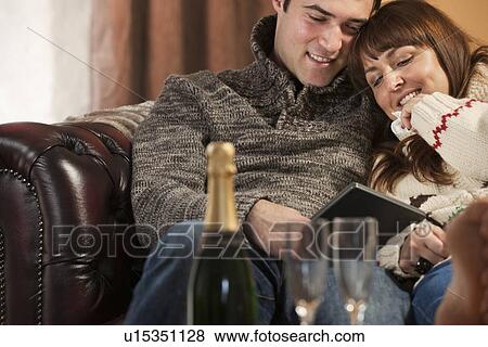Woman with boyfriend crying at movie View Large Photo Image Stock Photo - Woman with boyfriend crying at movie. Fotosearch