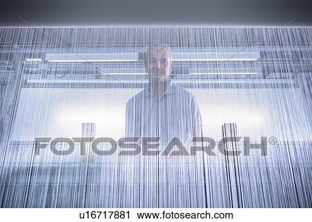 Worker using loom in textile mill View Large Photo Image Stock Image - Worker using loom in textile mill. Fotosearch