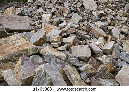 Stock Image - Close up of large rocks at quarry. Fotosearch
