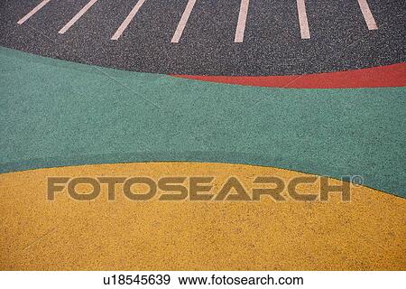 Close up of playground rubber floor View Large Photo Image Stock Photo - Close up of playground rubber floor. Fotosearch