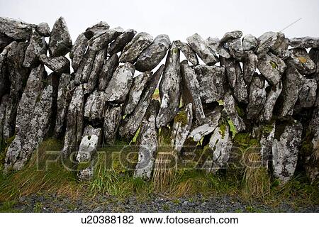 Stock Image - Close-up view of stone wall, Ireland. Fotosearch