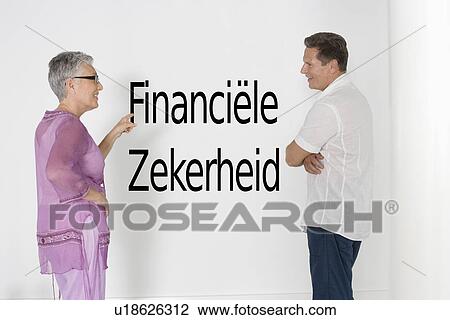 Couple discussing financial security against white wall with Dutch text "financiële zekerheid" View Large Photo Image Stock Image - Couple discussing financial security against white wall with Dutch text "financiële zekerheid". Fotosearch
