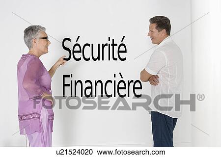 Couple discussing financial security against white wall with French text "Sécurité Financière" View Large Photo Image Stock Image - Couple discussing financial security against white wall with French text "Sécurité Financière". Fotosearch