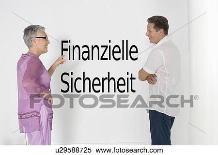 Couple discussing financial security against white wall with German text "Finanzielle Sicherheit" View Large Photo Image Stock Photography - Couple discussing financial security against white wall with German text "Finanzielle Sicherheit". Fotosearch
