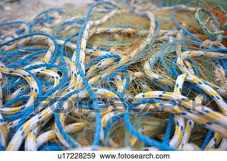 Stock Photo - Detail of fishing nets and ropes. Fotosearch