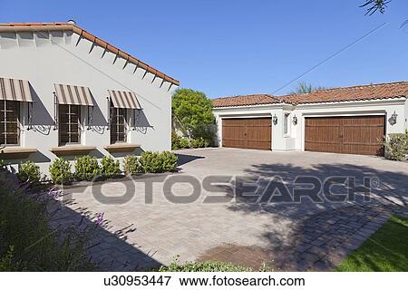Driveway with twin double garage View Large Photo Image Stock Photo - Driveway with twin double garage. Fotosearch