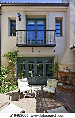 Entrance to a beautiful Mediterranean home exterior View Large Photo Image Stock Photography - Entrance to a beautiful Mediterranean home exterior. Fotosearch