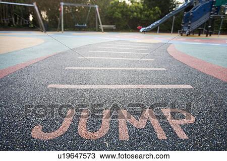 "Jump" written into rubber floor of playground View Large Photo Image Stock Image - "Jump" written into rubber floor of playground. Fotosearch