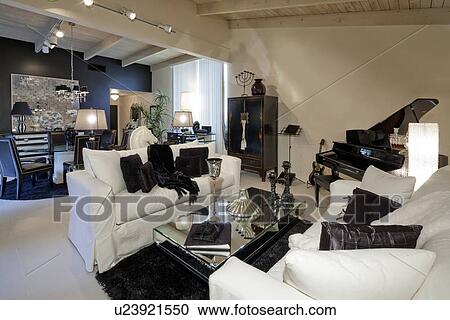 Stock Image - Living room and dining room. Fotosearch