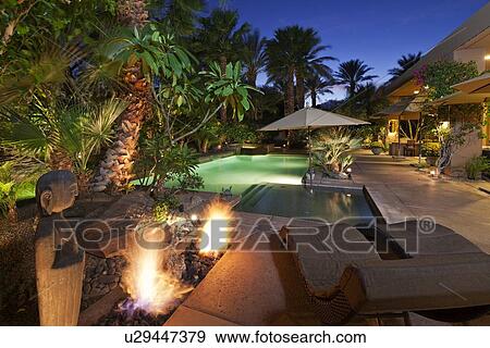 Stock Photo - Luxury Villa at night time. Fotosearch