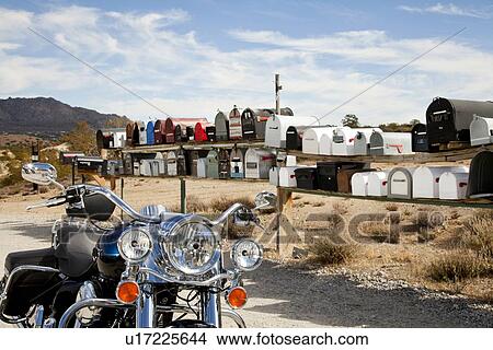 Motorcycle in front of rural mailboxes View Large Photo Image Picture - Motorcycle in front of rural mailboxes. Fotosearch