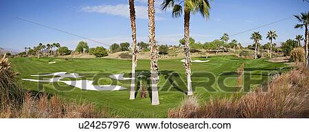Stock Photograph - Panoramic view of a golf course. Fotosearch