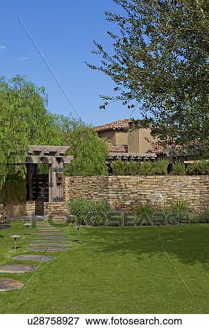 Stock Photo - Path leading up to House Exterior. Fotosearch