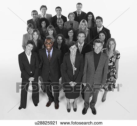 Stock Image - Portrait of multi-ethnic business team standing together. Fotosearch