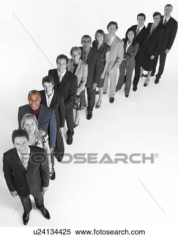 Portrait of multi-ethnic business team standing in line View Large Photo Image Stock Photography - Portrait of multi-ethnic business team standing in line. Fotosearch