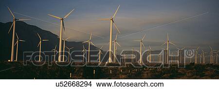Picture - Power generating windmills in remote area. Fotosearch